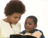 woman, boy, and bible